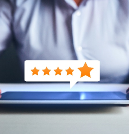 A picture of a person in a blue button-down with a five-star review above a tablet.