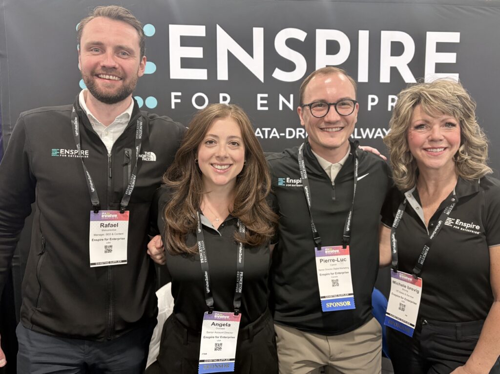 Rafael Matusiewicz, Angela Dowdell, Pierre-Luc Caron, Michele Brevig standing in front of the Enspire banner at the IFA Convention 2026. 