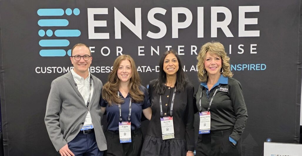 Pierre-Luc Caron, Angela Dowdell, Aparna Kriplani, and Michele Brevig standing in front of the Enspire banner at the IFA Convention 2026.